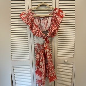 Adorable cut out orange printed dress with pockets